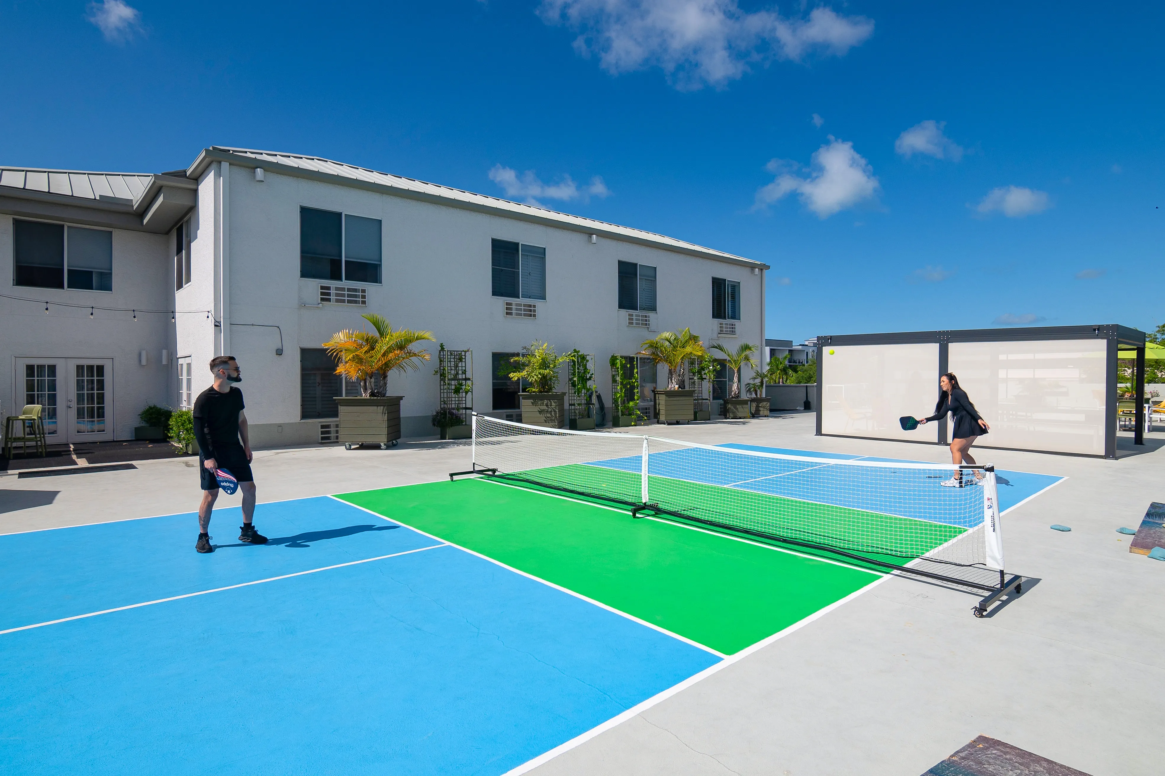 Couple Enjoying a Game of Pickleball